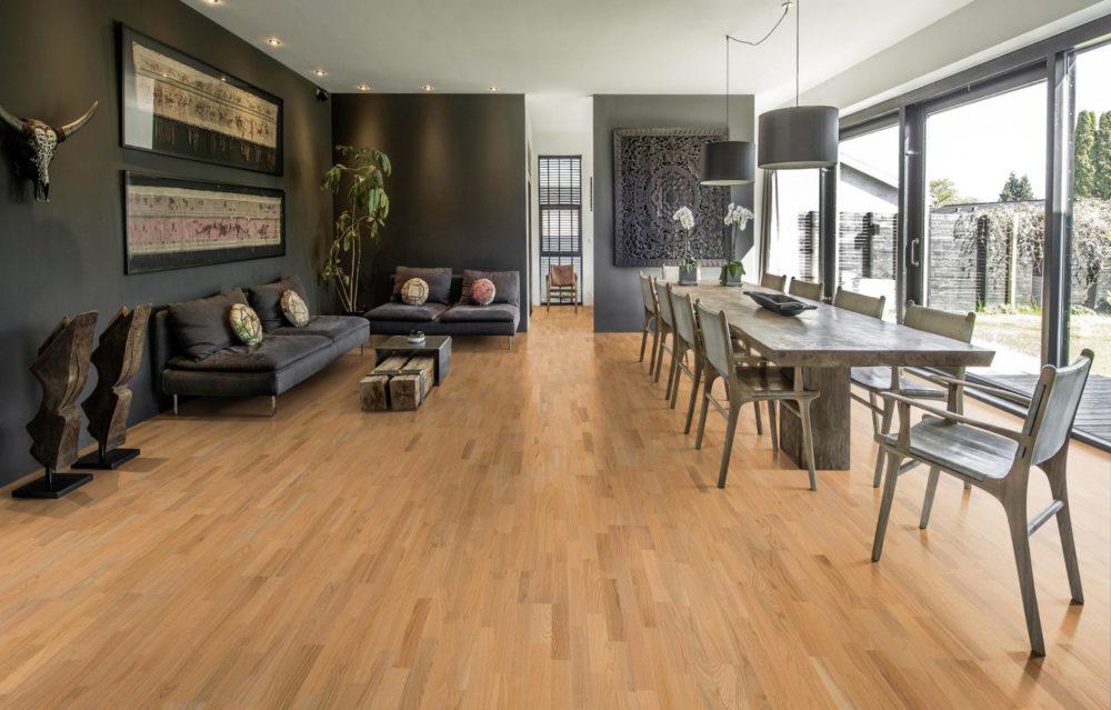 Living Room With Wood Walls And Wood Floor