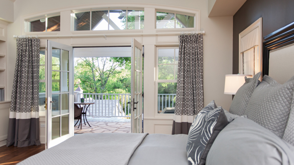 Bedroom With French Door To Living Room