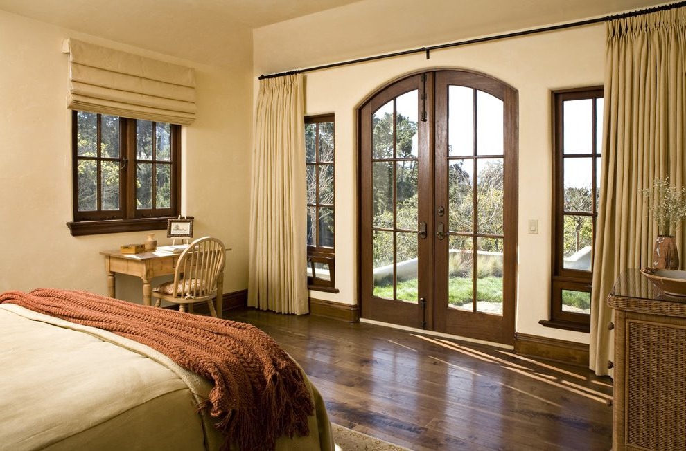 Bedroom With French Door To Living Room