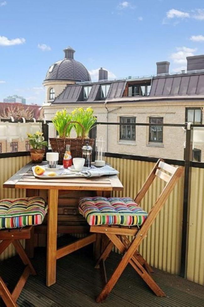 Chairs and tables in the decoration of small balconies