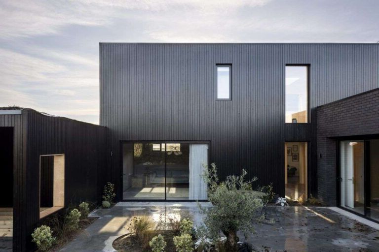 Cement, wood, glass and stone facades