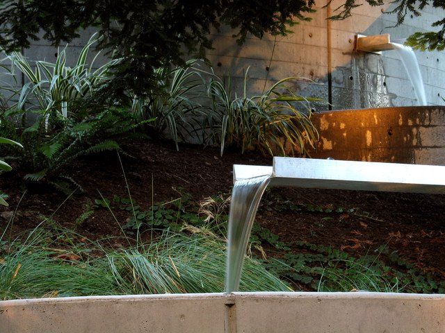 Water fountains in industrial style gardens