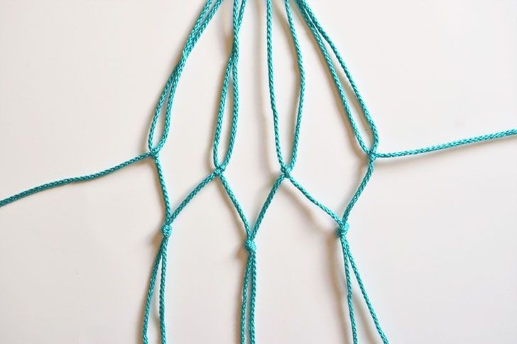 Hanging glass and macramé planters