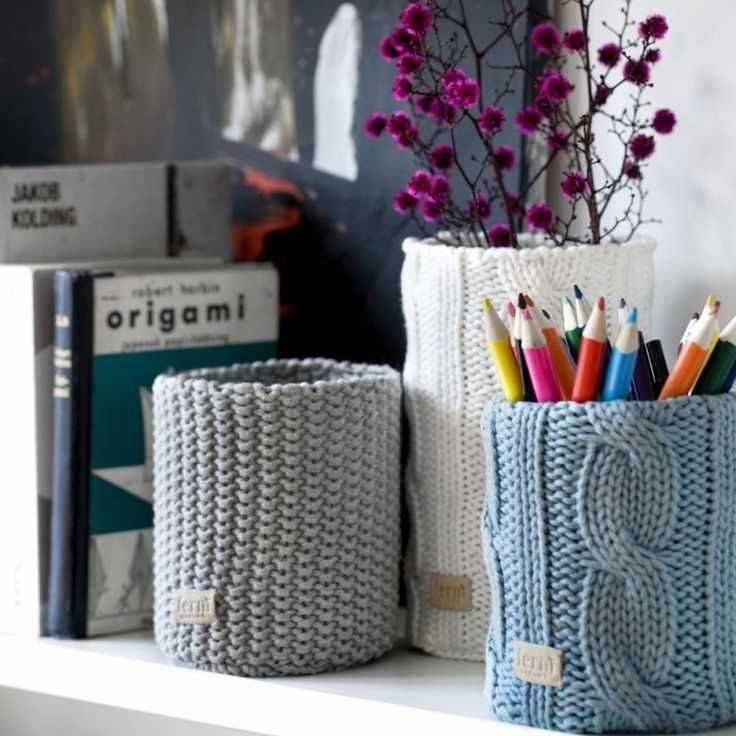 Vases decorated with knitted fabric