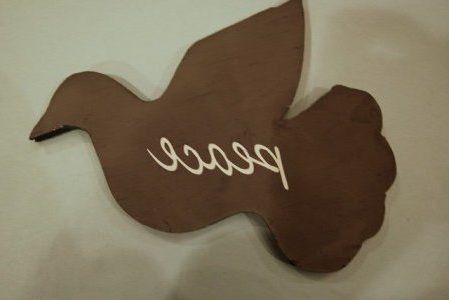 Dove of peace in wood