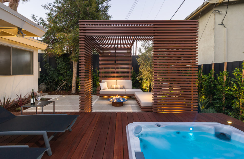 Wooden slat pergola with patio